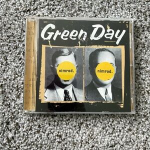 Green Day Nimrod Album CD - Iconic Black and Yellow Design
